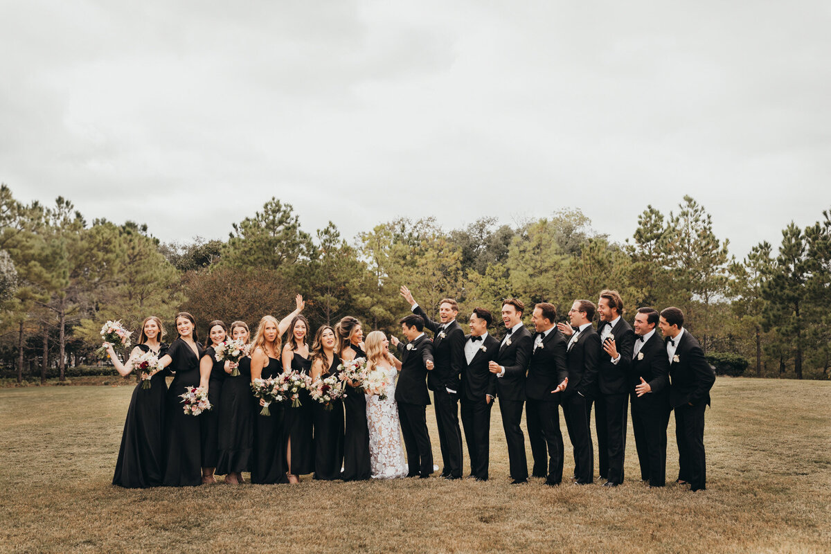 bridal party celebrates nuptuals