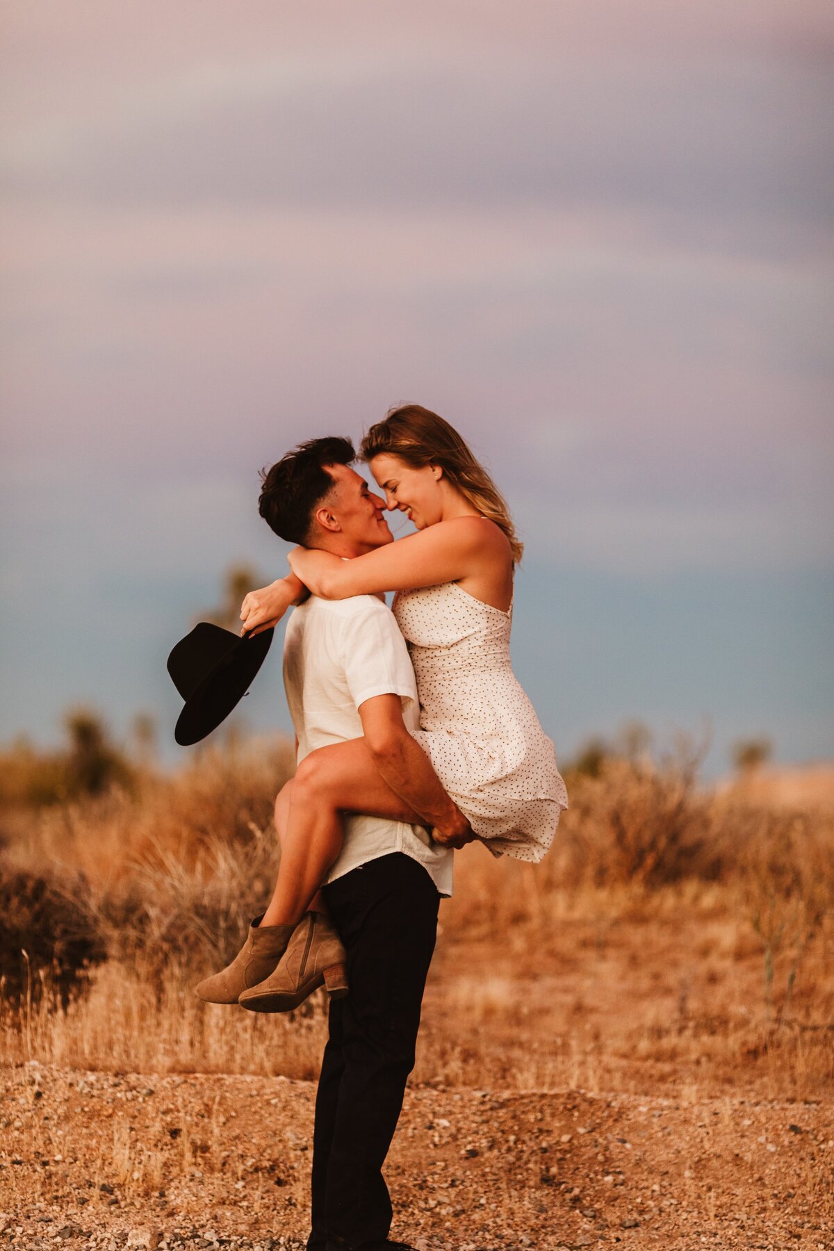 couple-embracing-joshua-tree