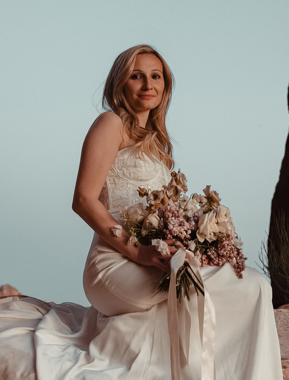 Kiss at golden hour overlooking Sedona valley taken by Kollar Photography