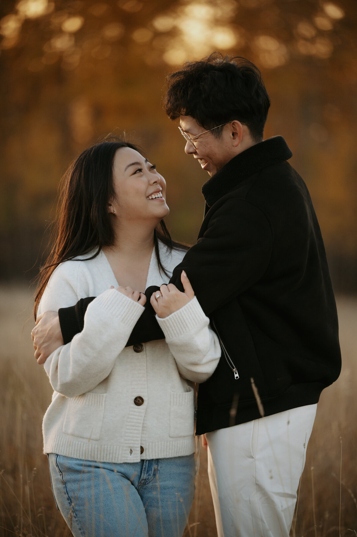 Photoshoot of engaged couple taken outdoors in Edmonton