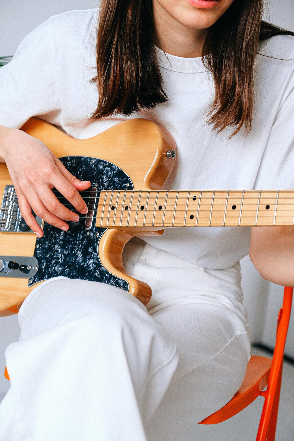 woman playing guitar