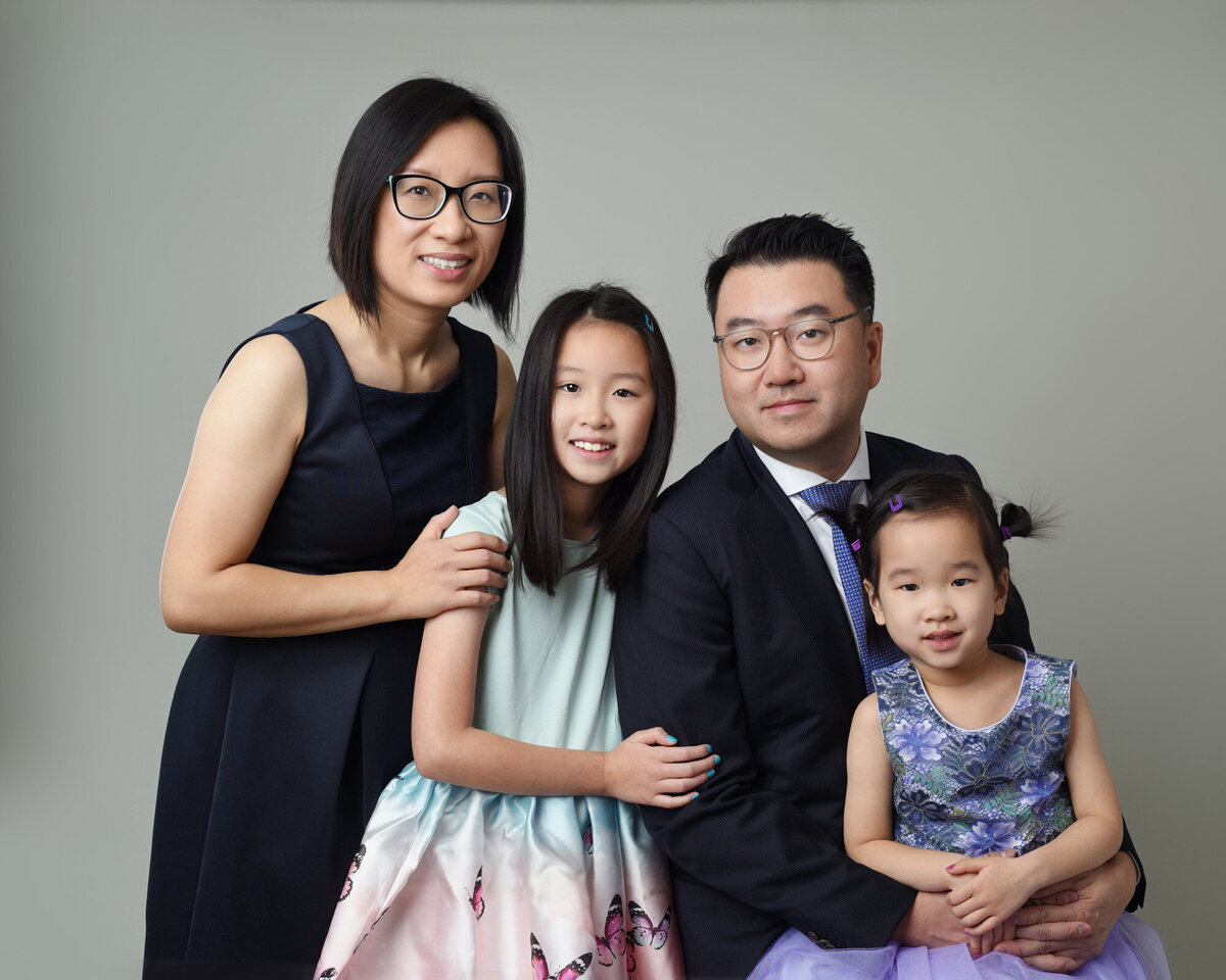 Formal family in studio portrait