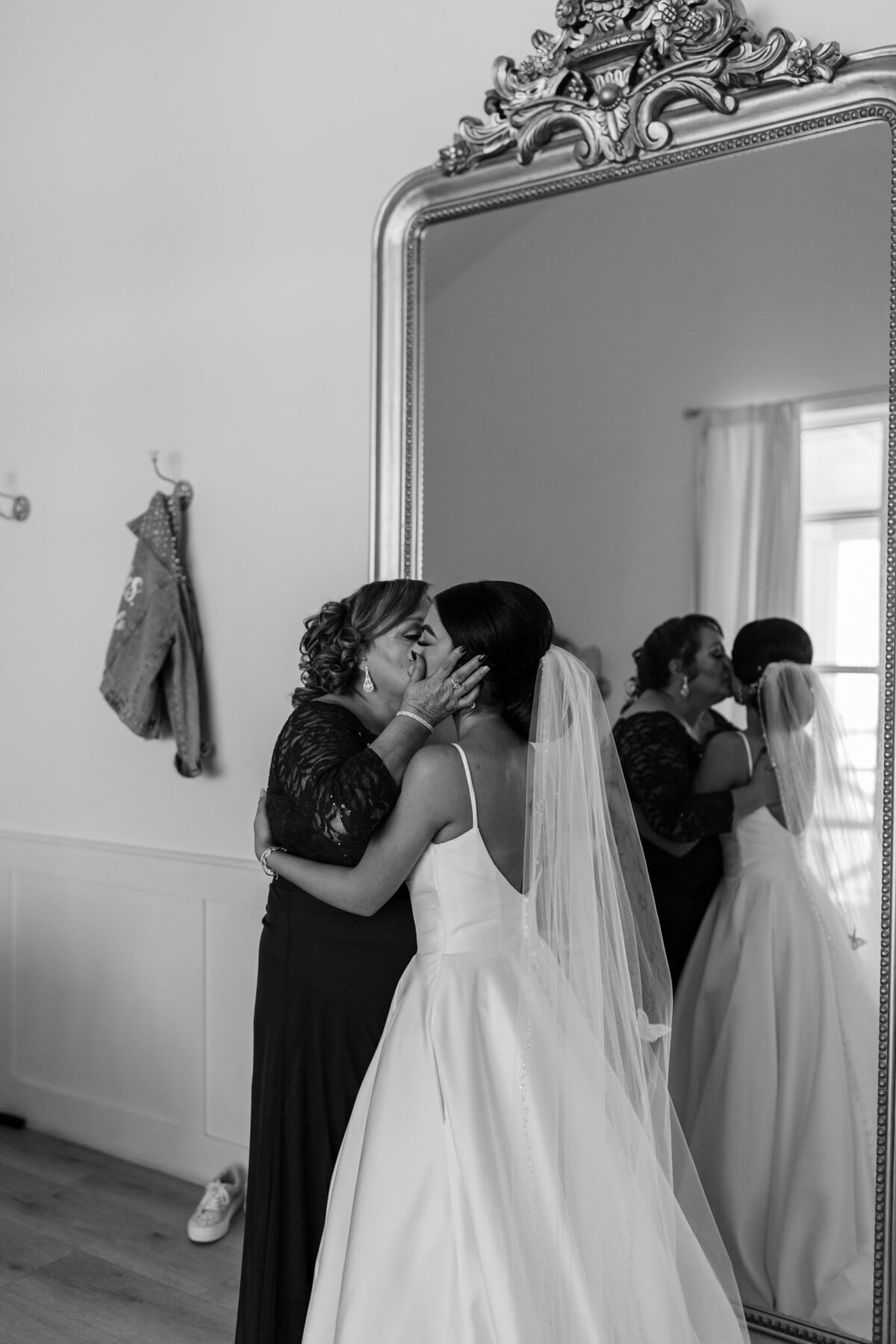 kiss from the mother of the bride