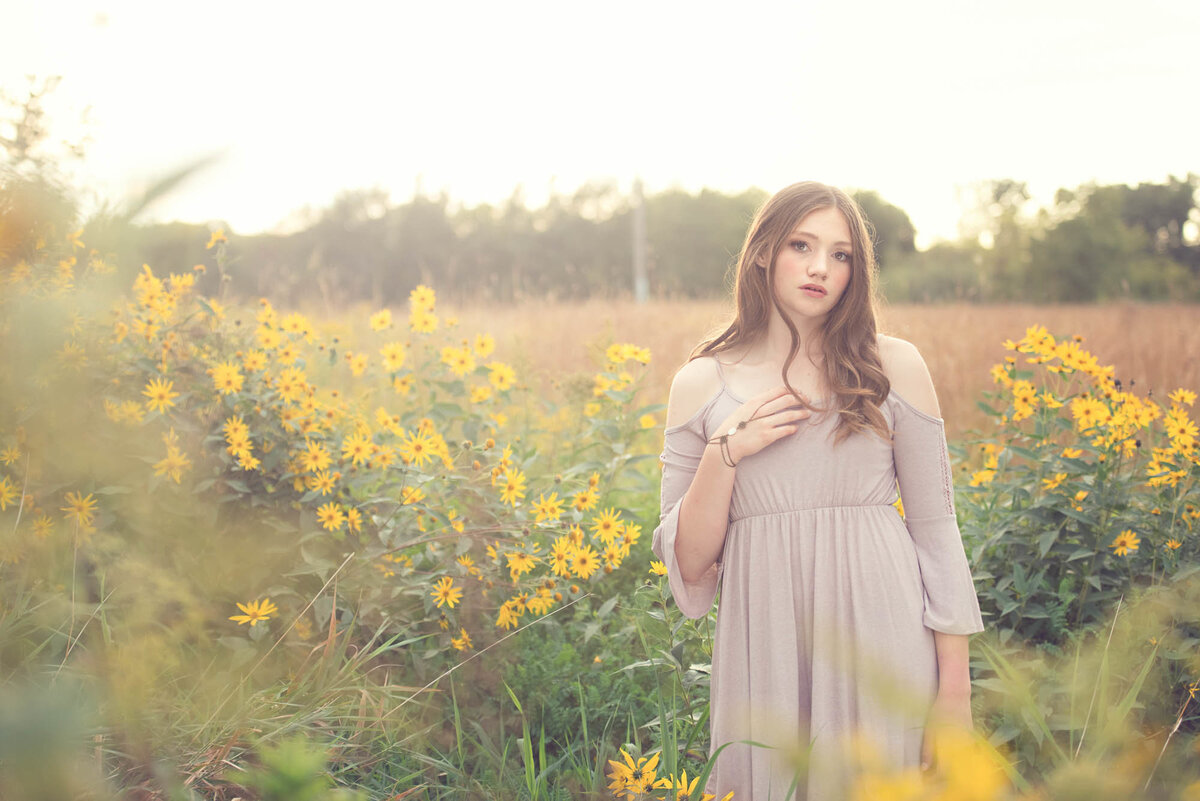 modern senior pictures in field of flowers minnesota photographer2