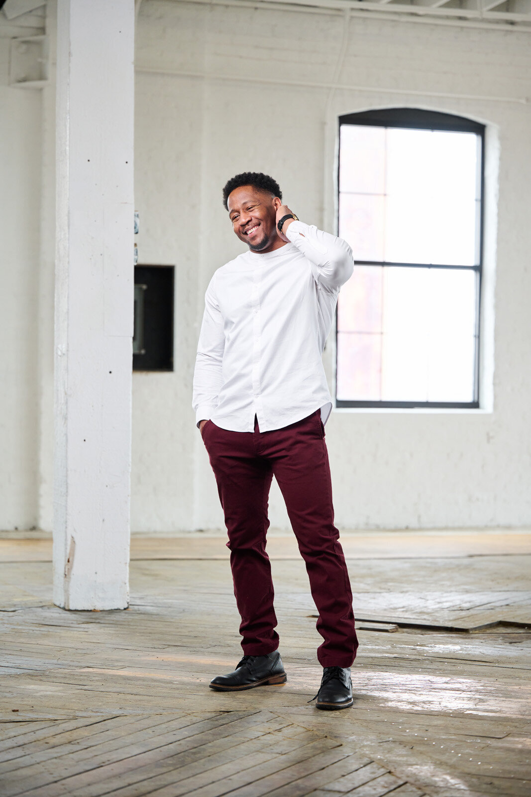 Smiling Man in Bright Studio by Headshot Photographer in Minneapolis-33