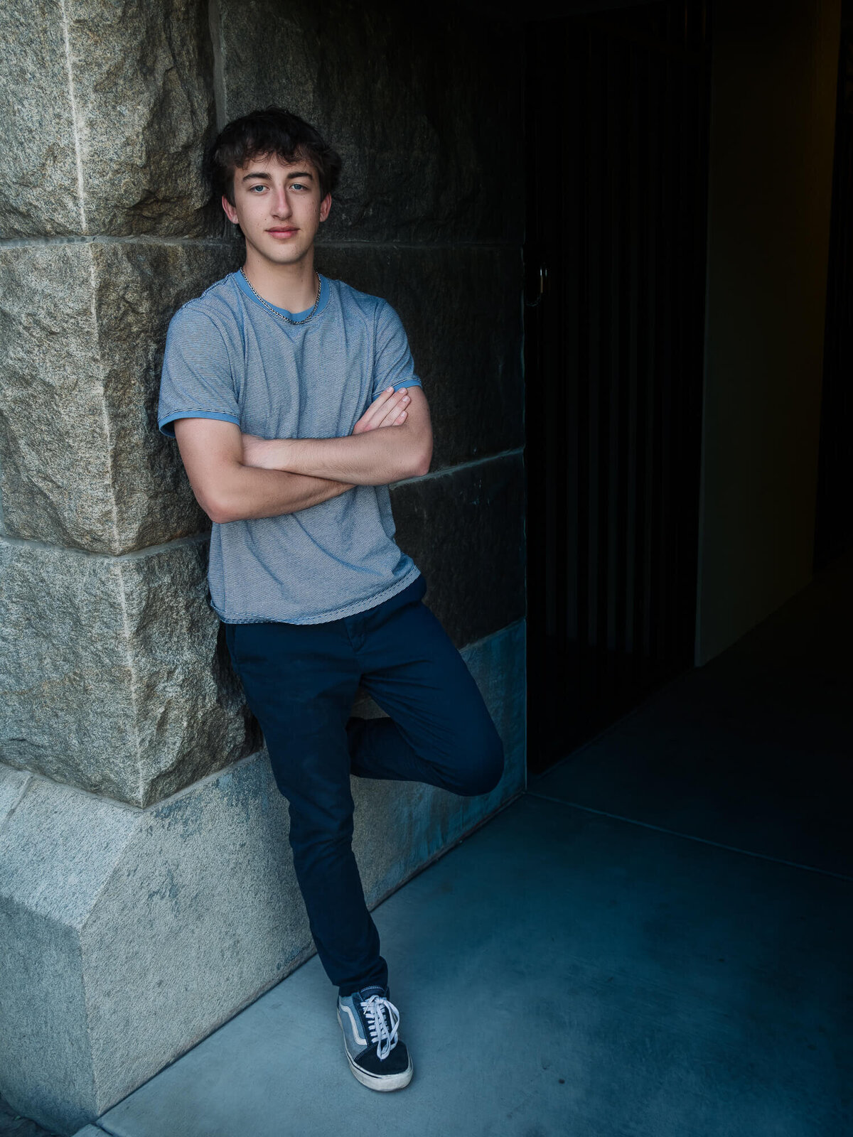 Boy poses at courthouse in Prescott senior photography session