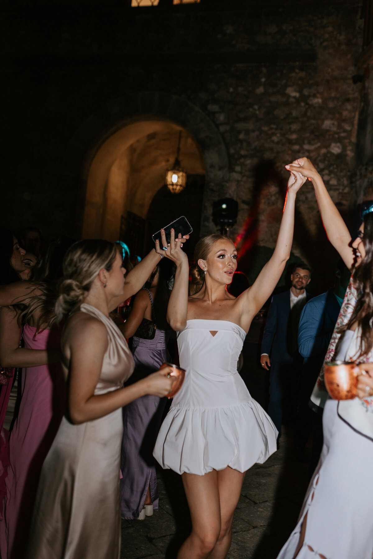 Dancing bride at Cstello di Celsa wedding venue Italy