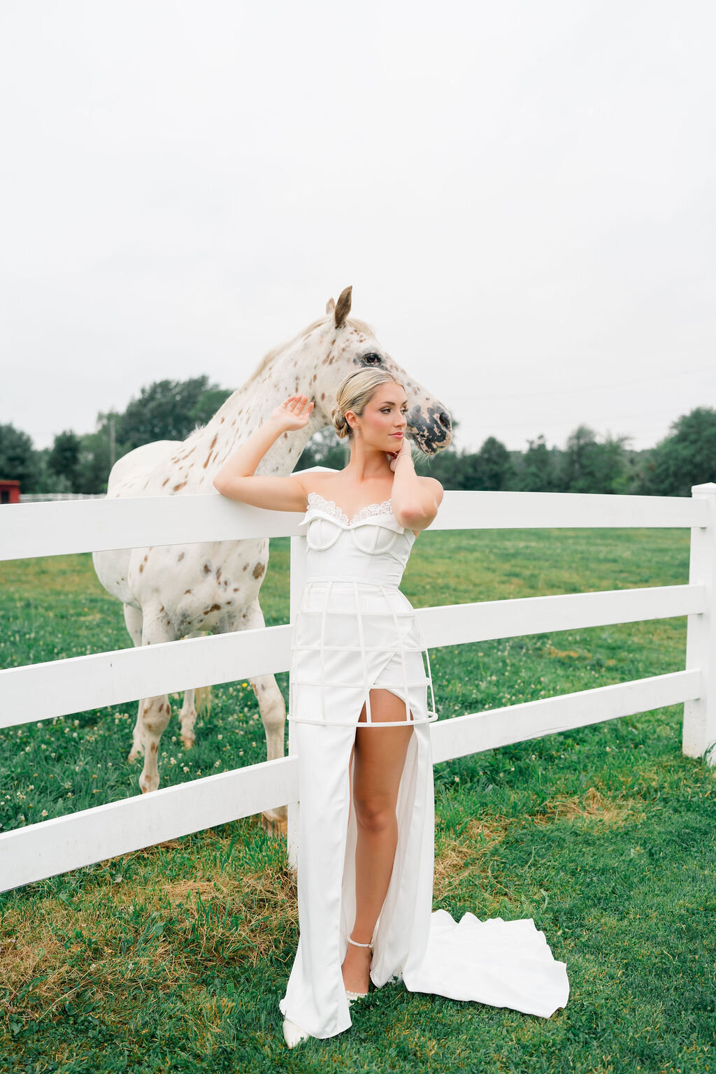 Luxurious bridal gown with detachable sleeves and blusher veil accents
