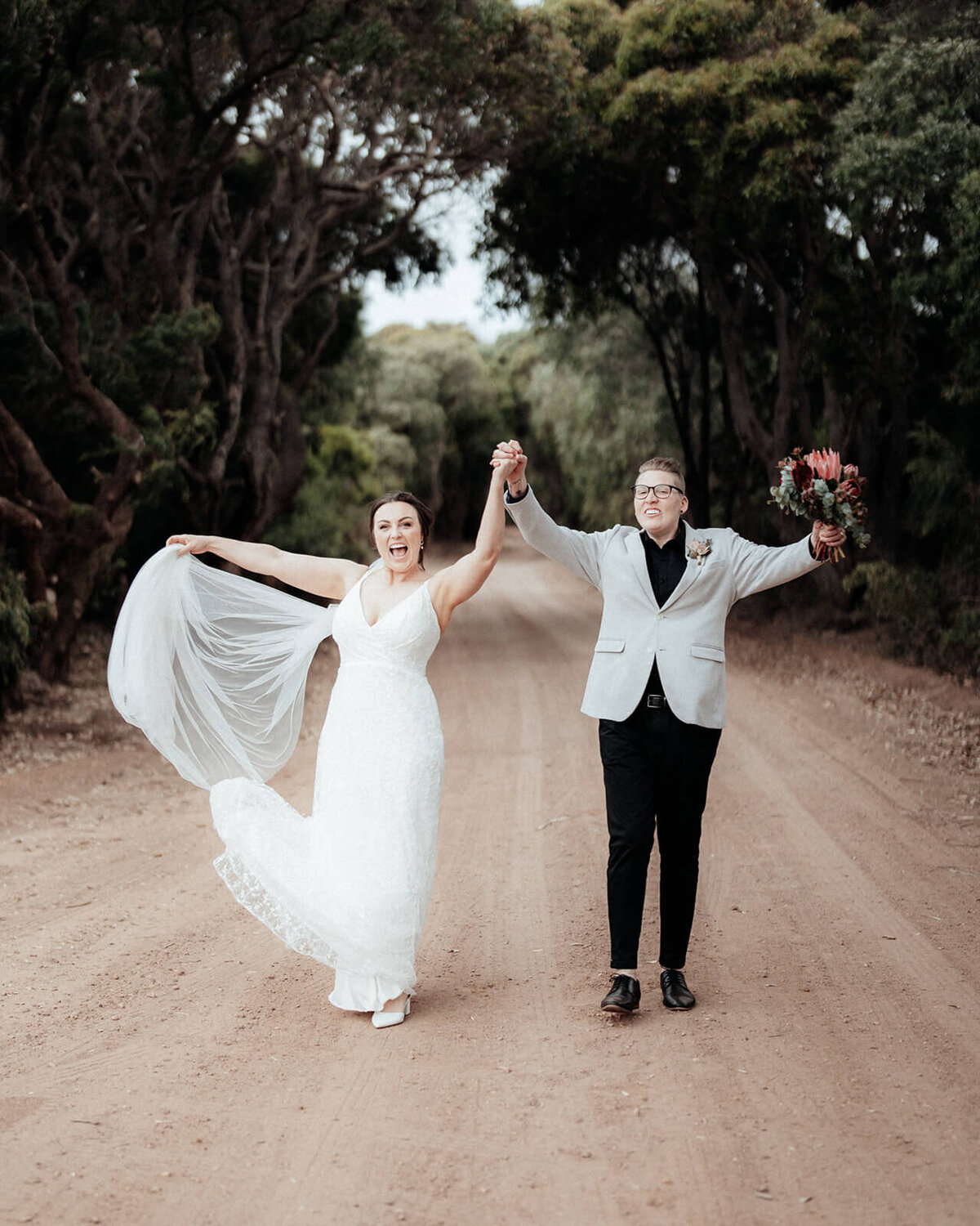 Two Brides happy on their wedding day