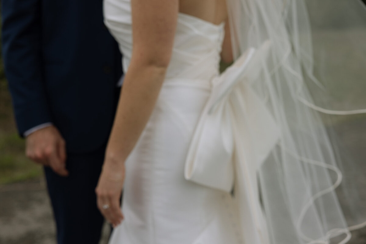 Bride's wedding dress bow shot in an abstract way by wedding photographer. 