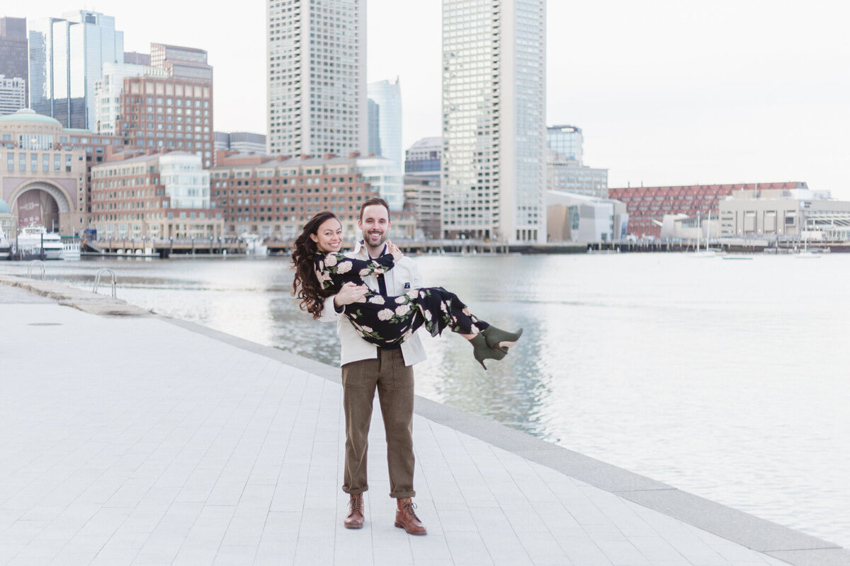 Engaged couple at Fan Pier Park