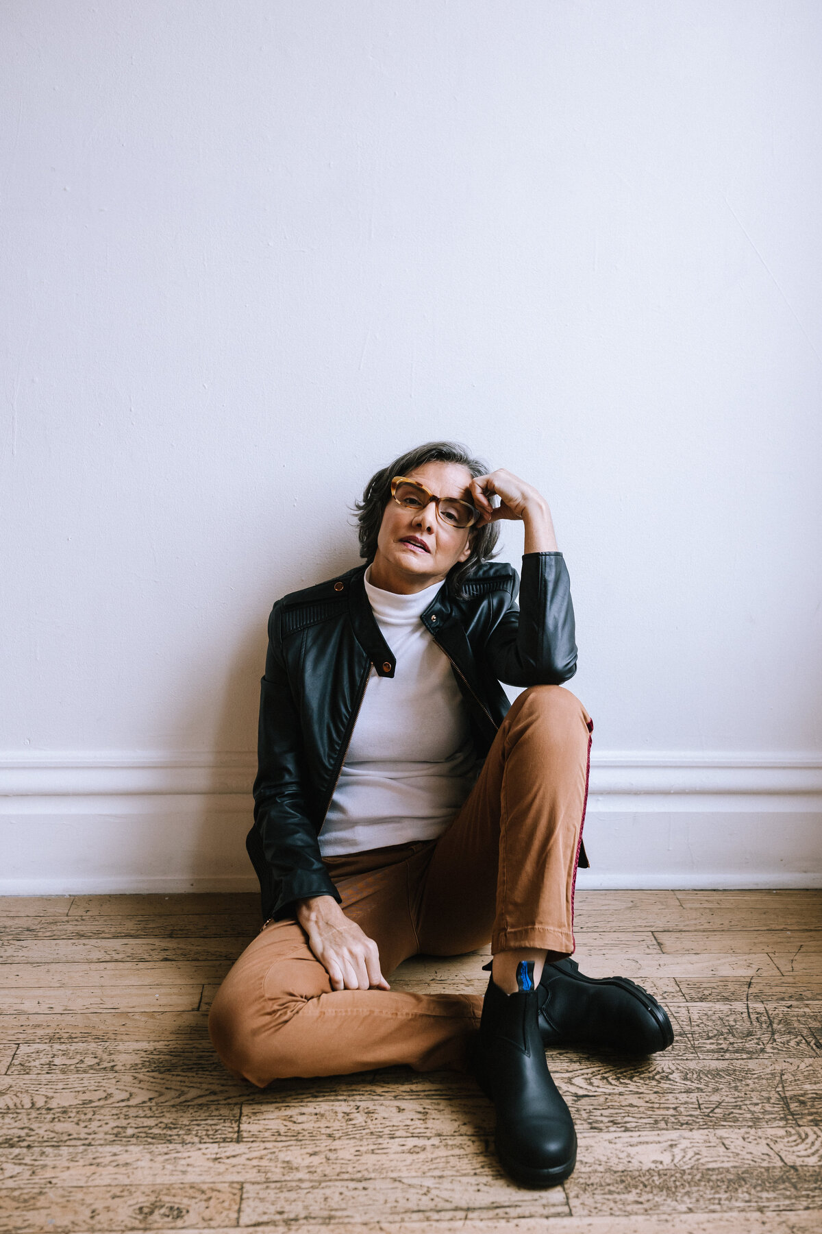 Woman wearing glasses for branding photos for North Point Eyewear of Pittsburgh. 