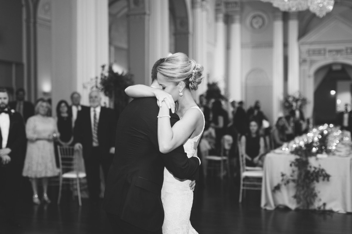 An emotional first dance of the bride and groom.  Real wedding photographed by Atlanta luxury photographer Rebecca Cerasani.
