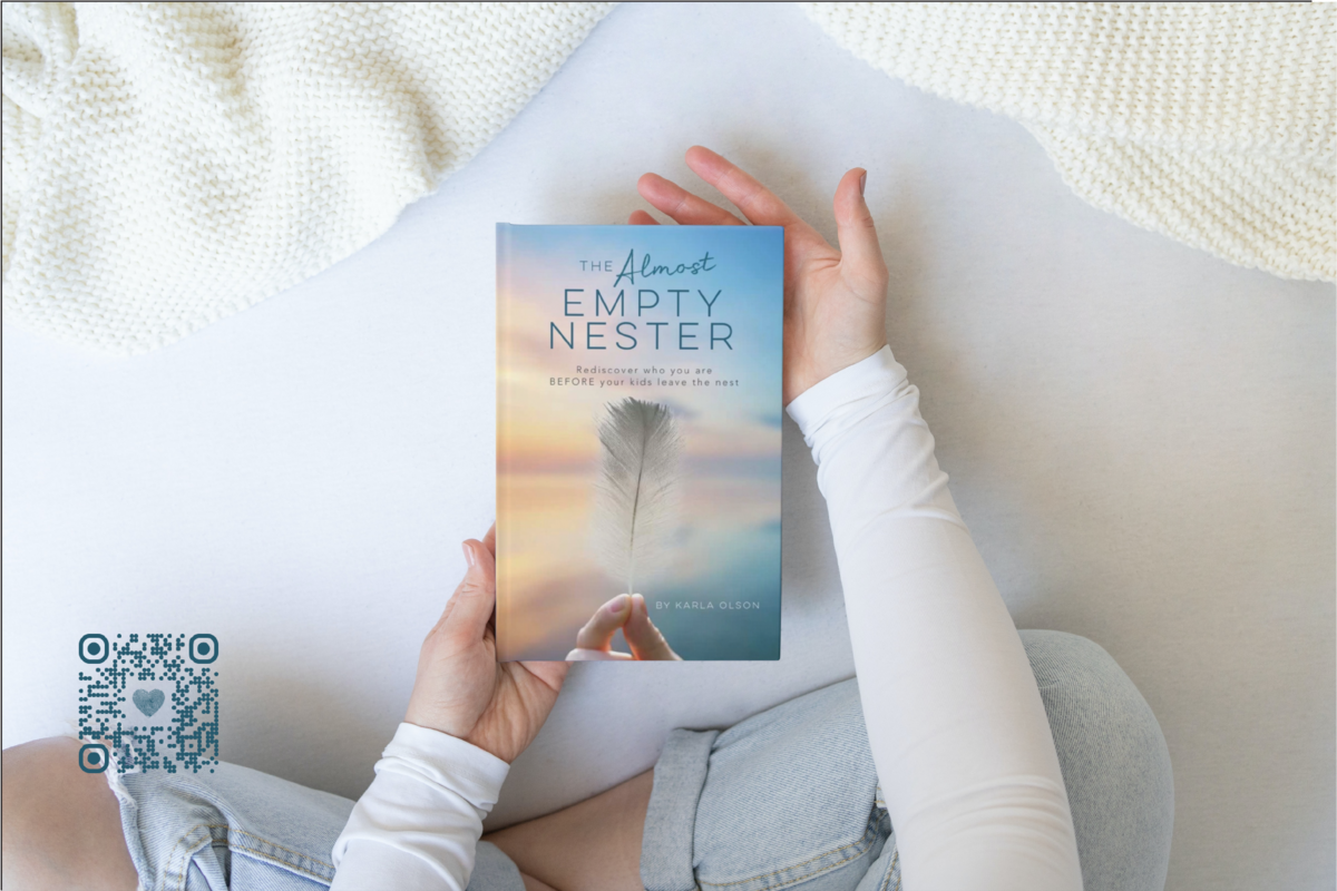 custom postcard with photograph displaying woman holding The Almost Empty Nester book in hands by Sweet Pea Ink Creative.