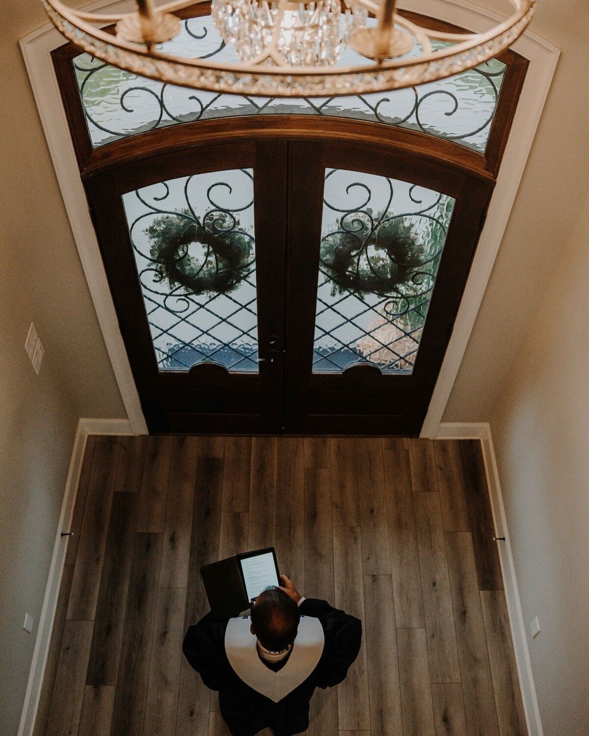 a pastor awaiting the bride and groom at chickadee hill farms wedding venue in north carolina