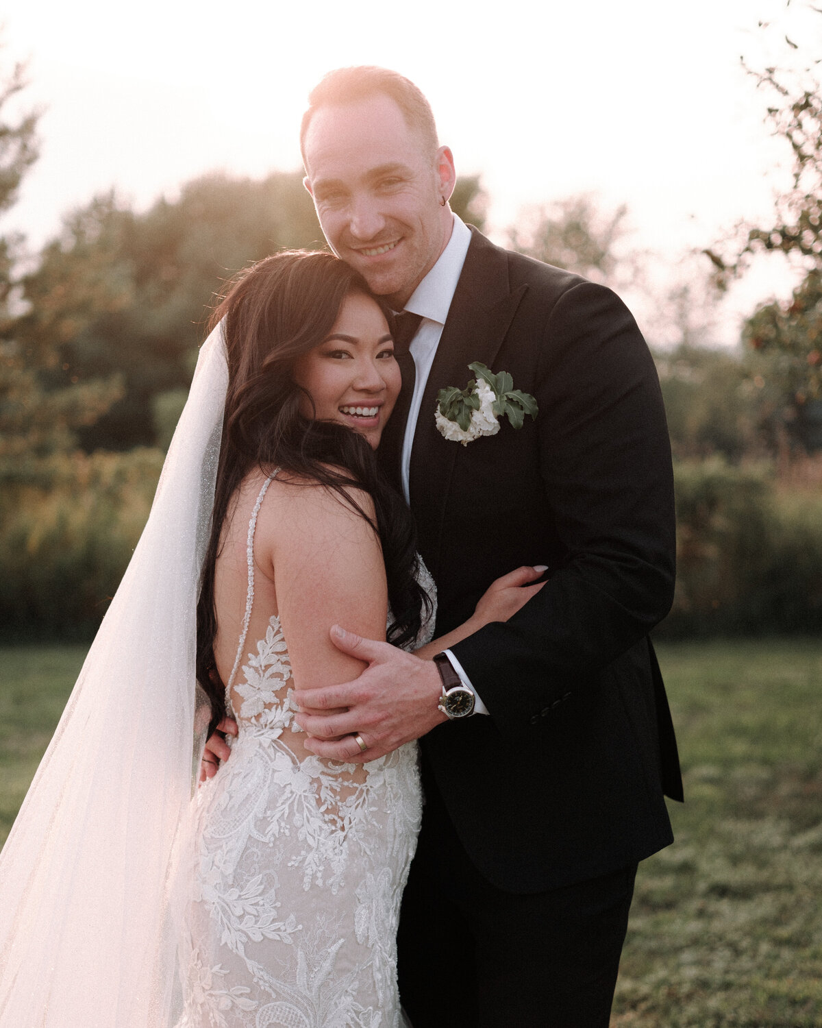 backlit classic portrait of bride and groom