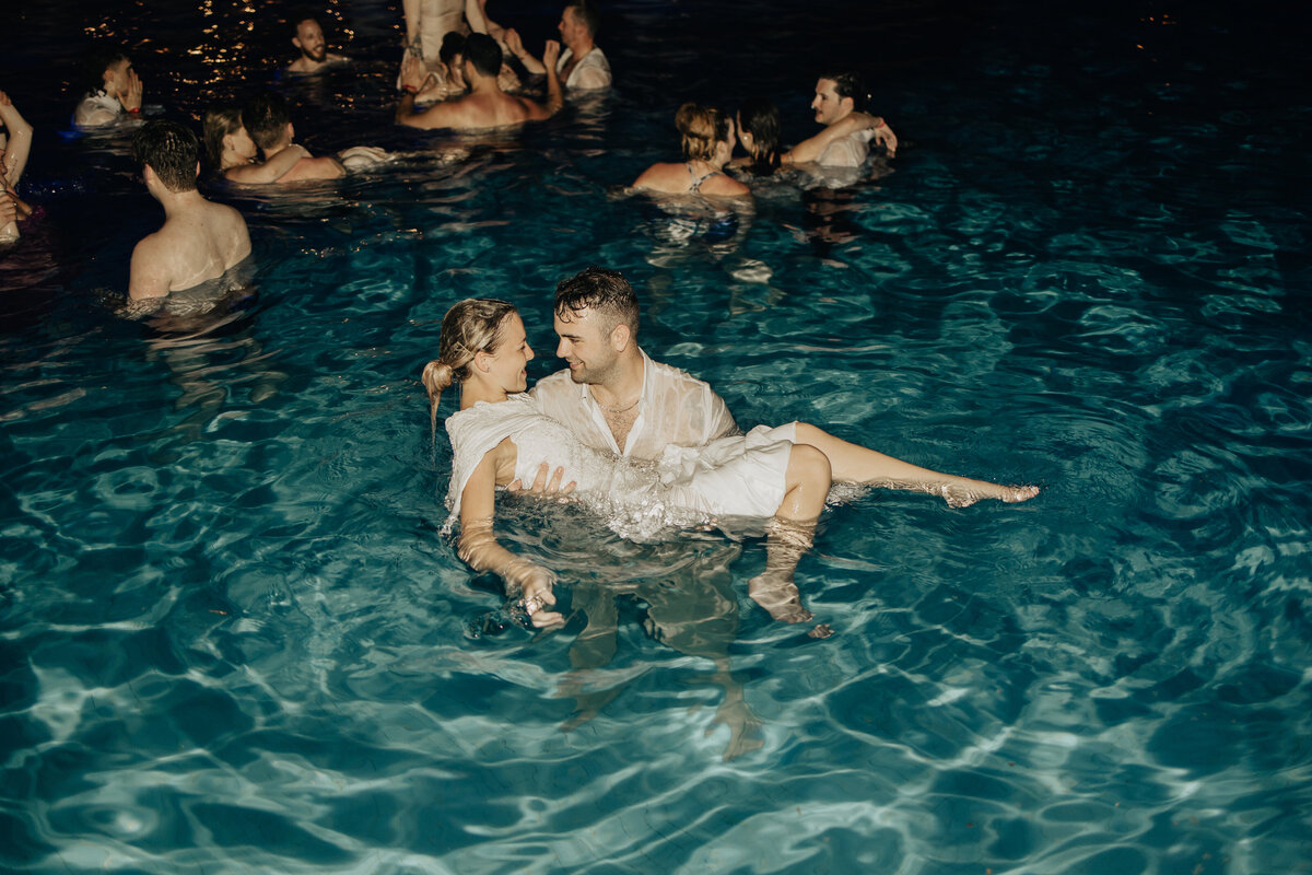gracie + conar - playa del carmen wedding - wedding party jumping into pool - jq films-48