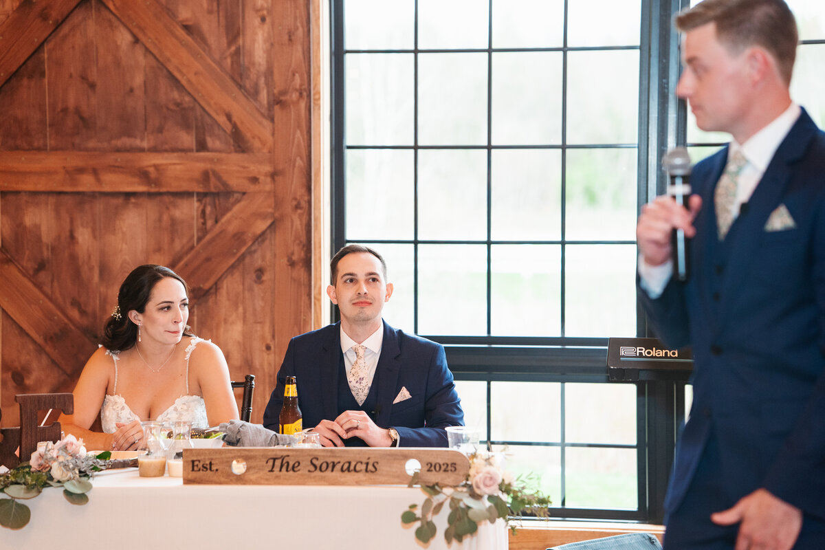 Reception decor featuring rustic charm and romantic candlelight
