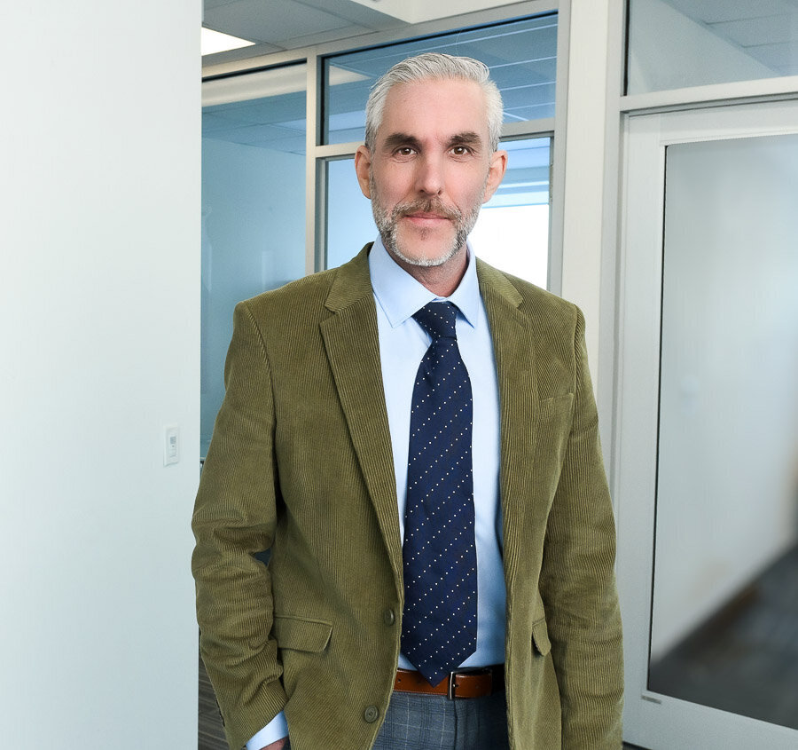 Business headshot in green blazer