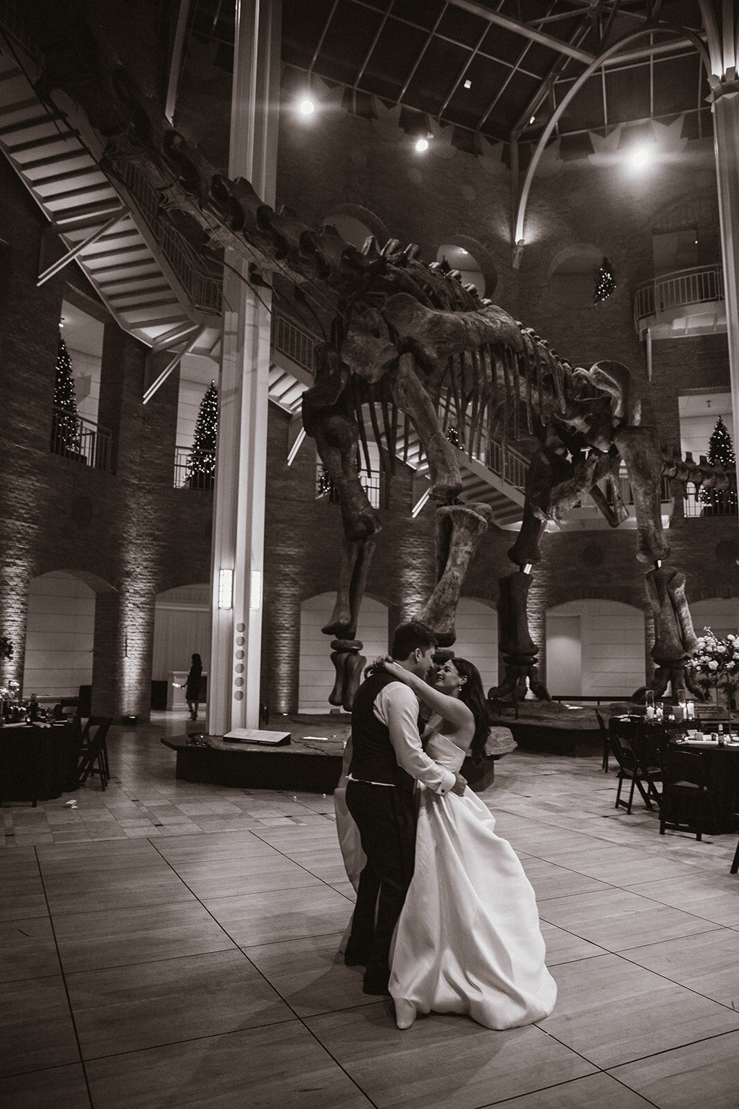 bride and groom share first dance at fernbank museum in atlanta