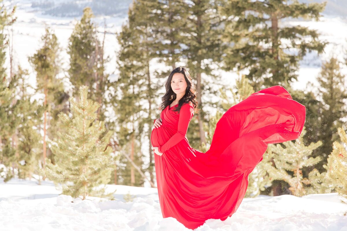 Maternity gown train flying in the air, Estes Park, CO