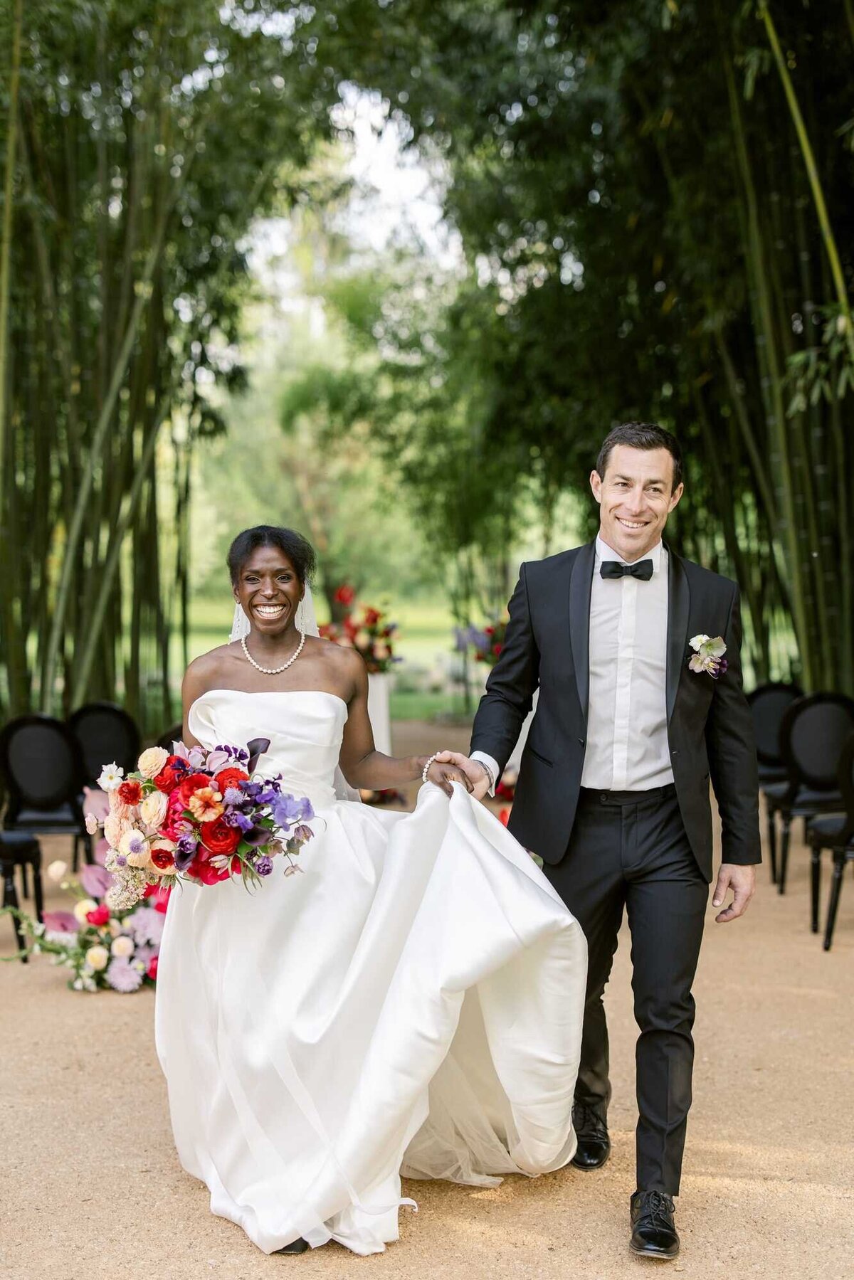 A-very-elegant-couple-with-a-colorful-bridal-bouquet