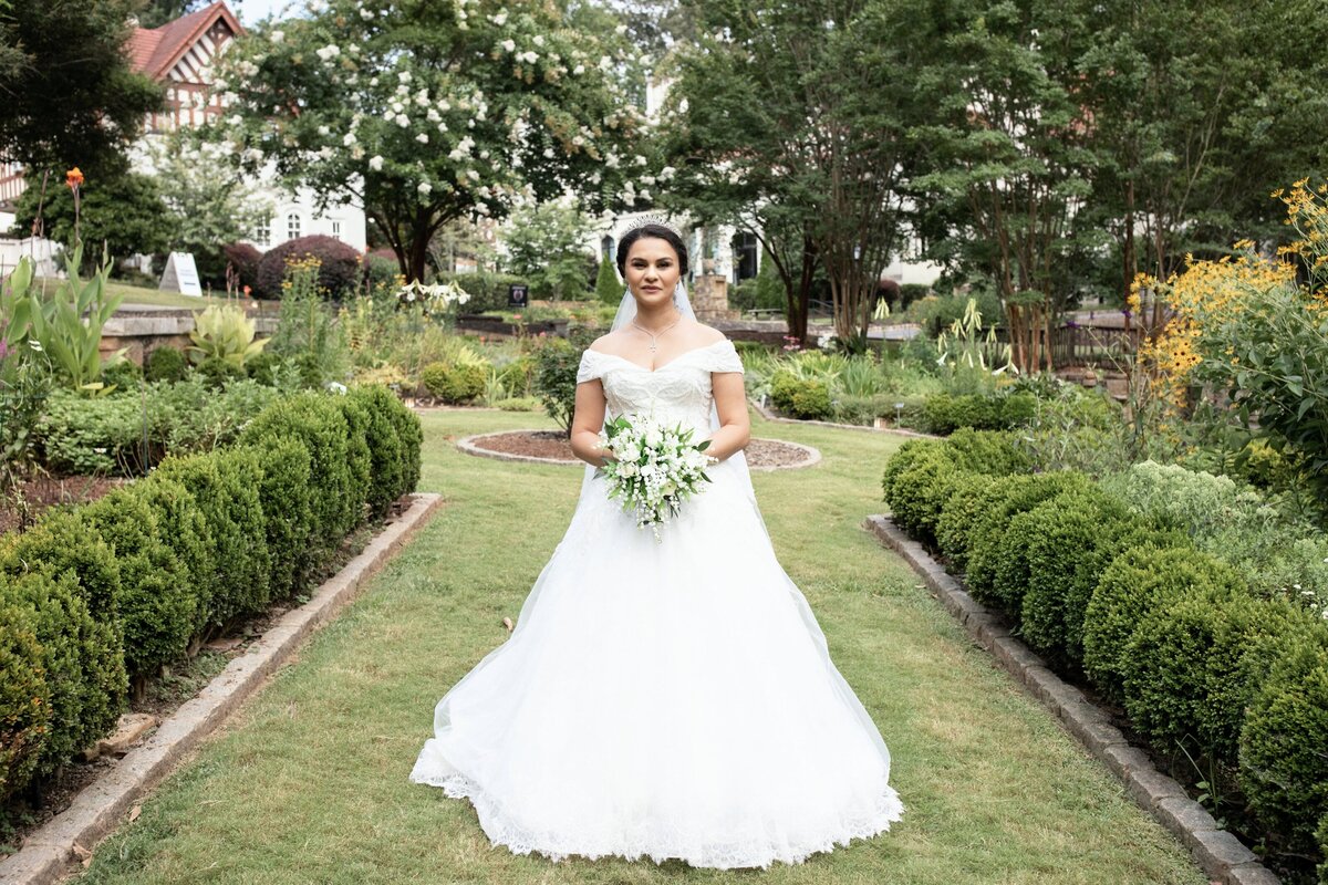 bride-smiling-in-garden-quiet-luxury-wedding-atlanta