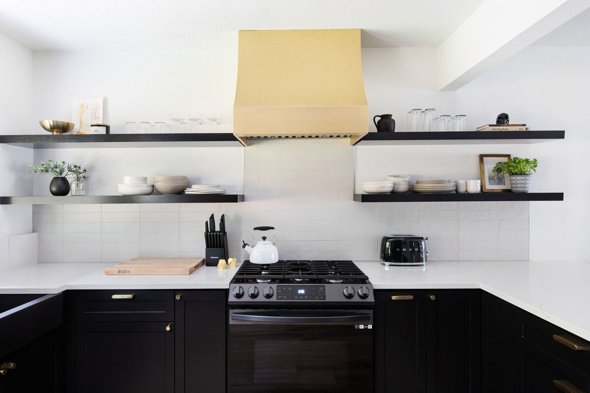 modern chic posh kitchen black and brass remodel rental design 8