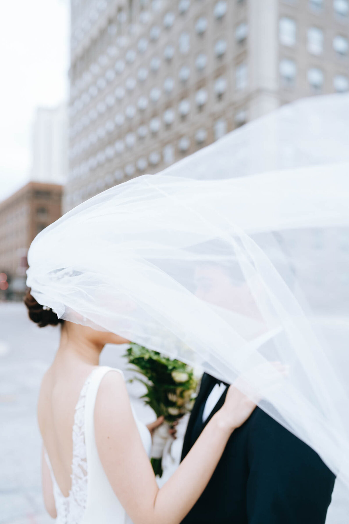brides veil blowing in the wind