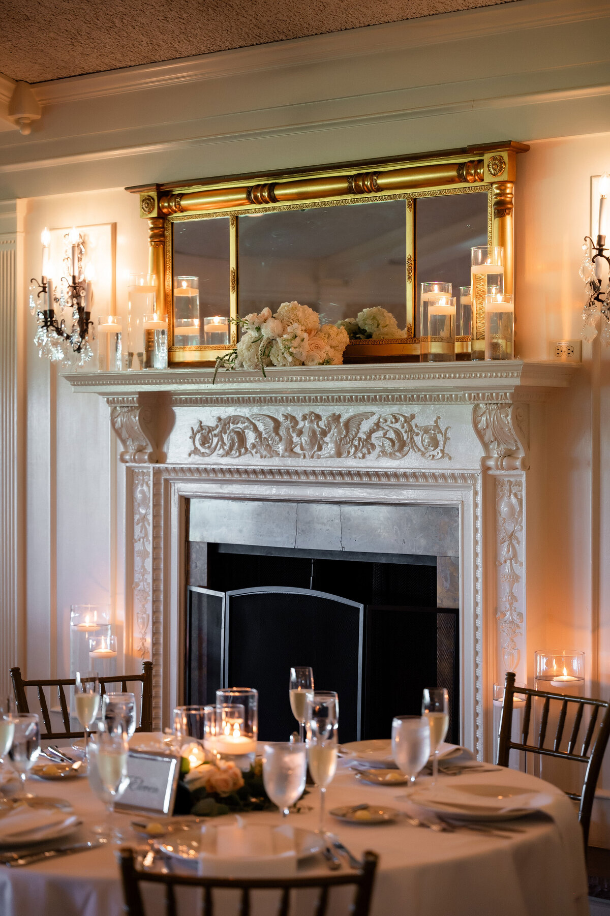 fireplace decor by summerhouse flowers at oakmont country club