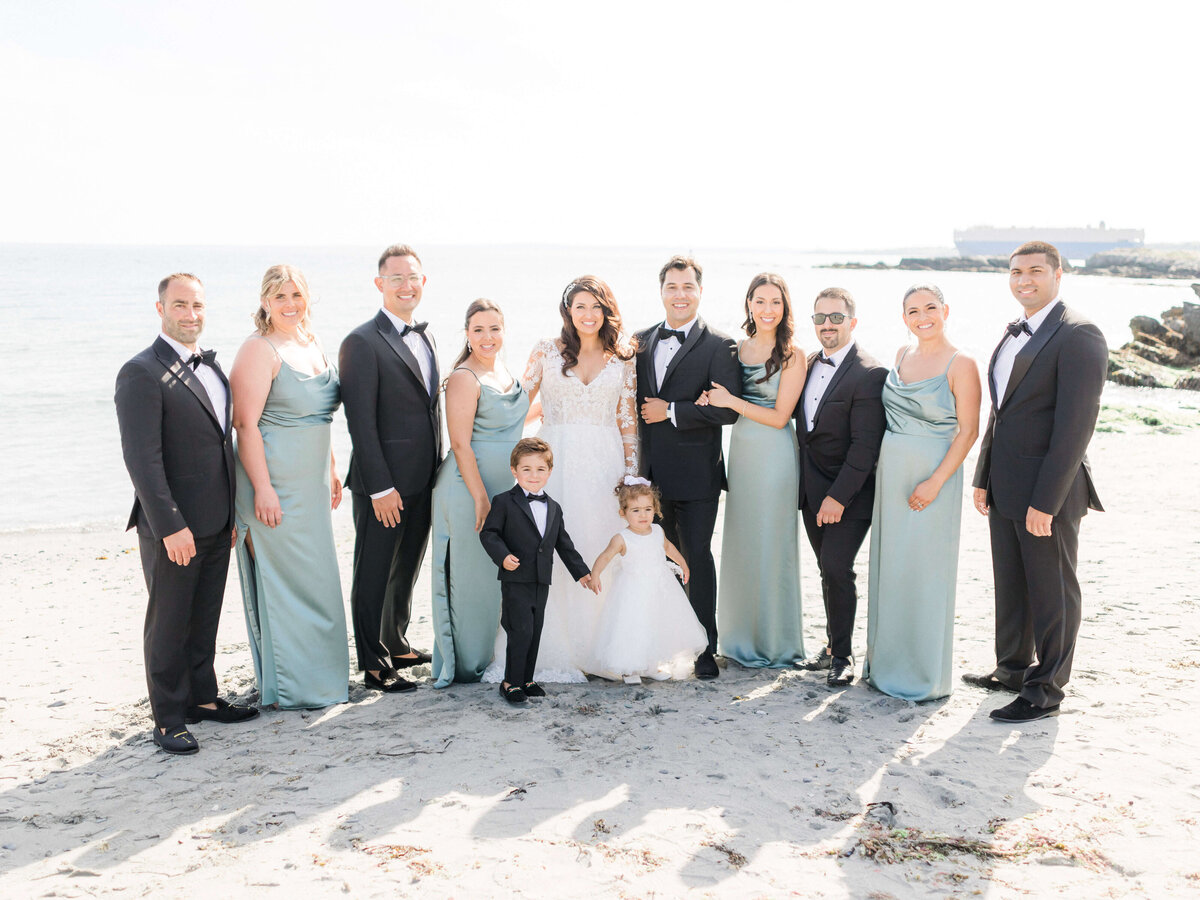 wedding party on the beach at castle hill inn newport RI