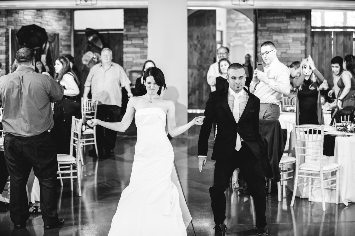 canyonwood ridge wedding photographer bride groom reception entrance 250 S Canyonwood Dr, Dripping Springs, TX 78620