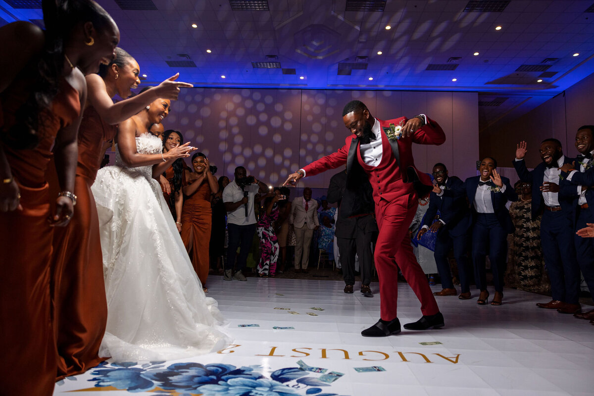 Tomi and Tolu Oruka Events Ziggy on the Lens photographer Wedding event planners Toronto planner African Nigerian Eyitayo Dada Dara Ayoola ottawa convention and event centre pocket flowers Navy blue groom suit ball gown black bride classy  105