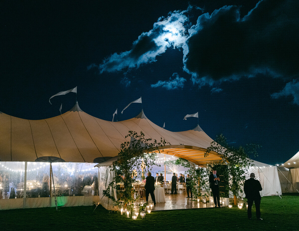A Sperry Tent at night with moonlight at the Chatham Bars Inn