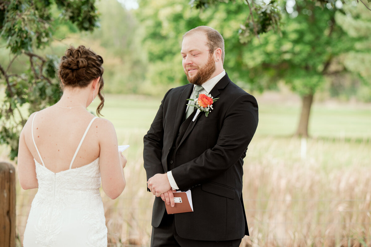 8211-Wedding at The Grands at Mulligans in Sartell Minnesota- Wedding Photographer Nicole Hollenkamp