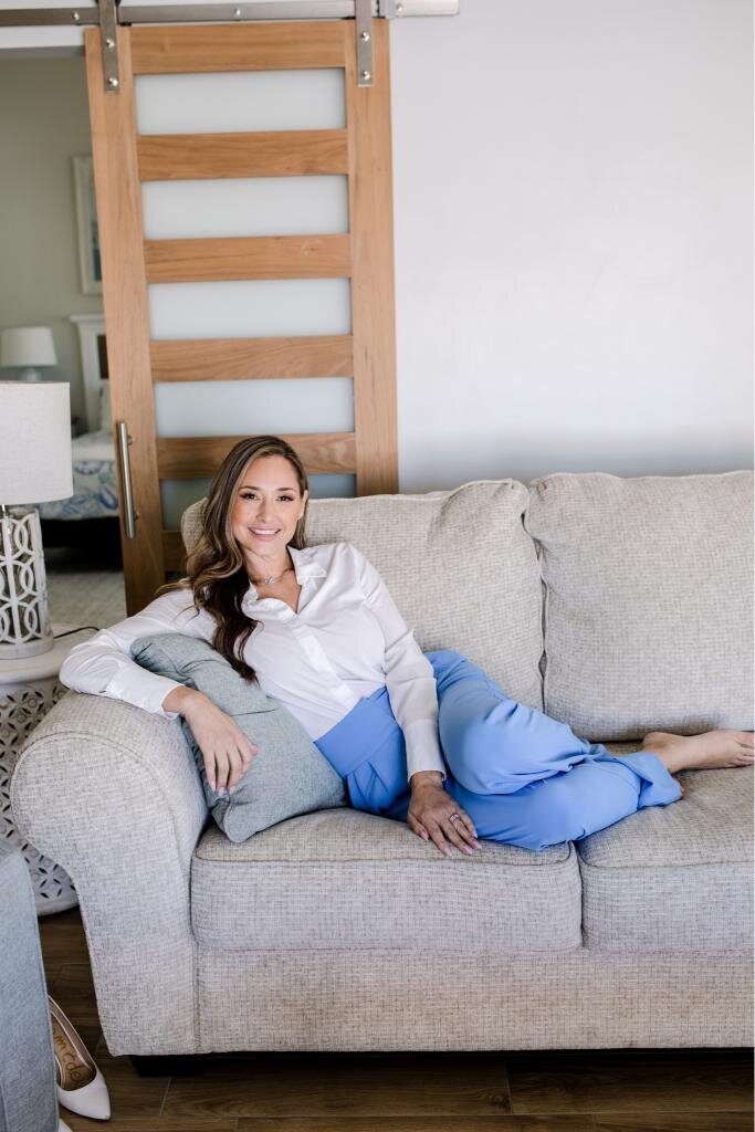 Charlene’s cozy sofa image is ideal for personal branding photoshoots focused on home decor and relaxed living.