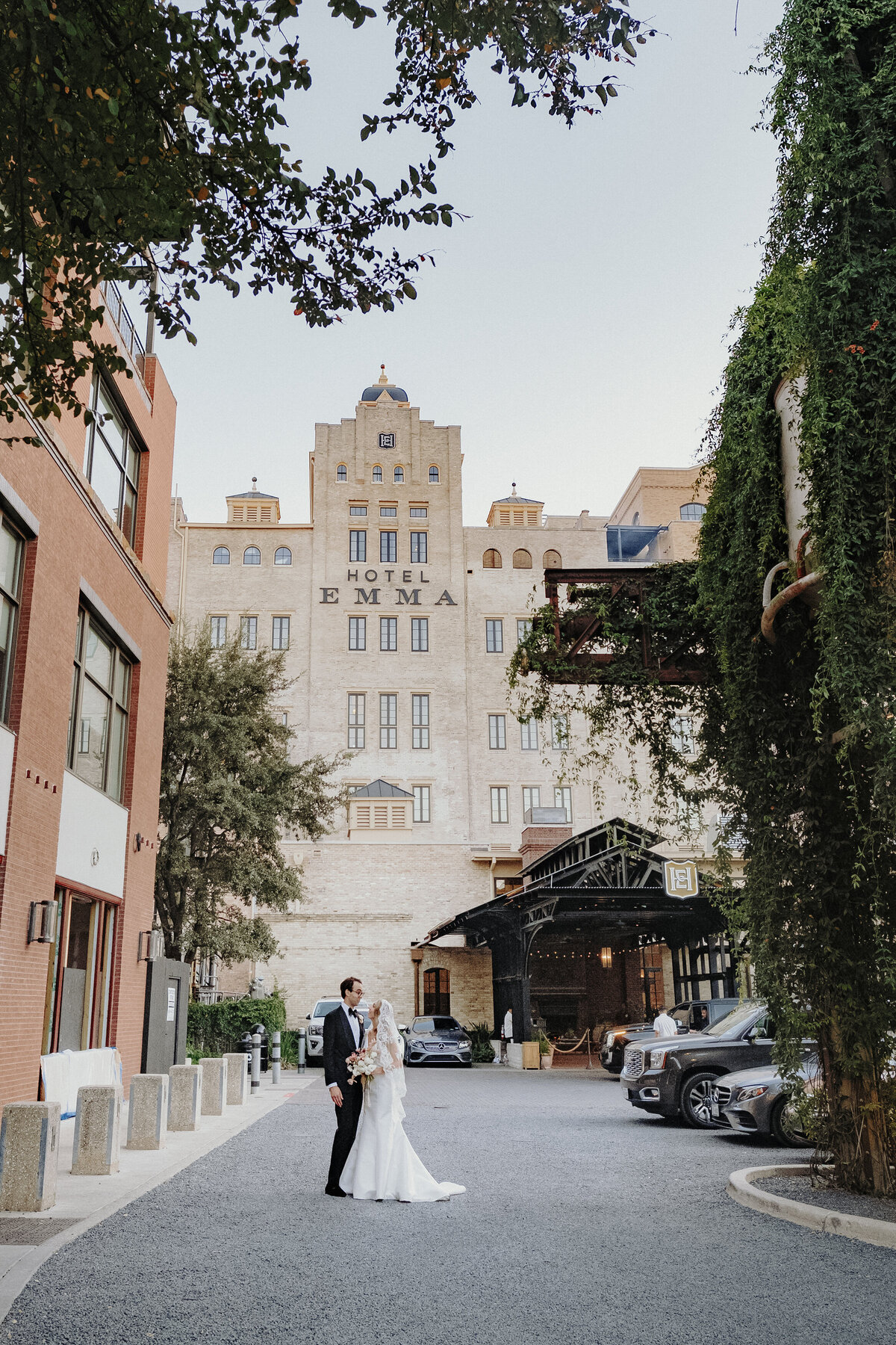 Wedding Portrait in front of Hotel Emma front Entrance in San Antonio Texas Shy Laurel Photography
