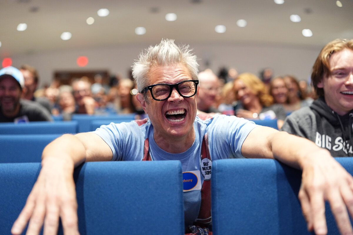 kansas-city-event-photography-0256-audience-member-smiling-and-cheering
