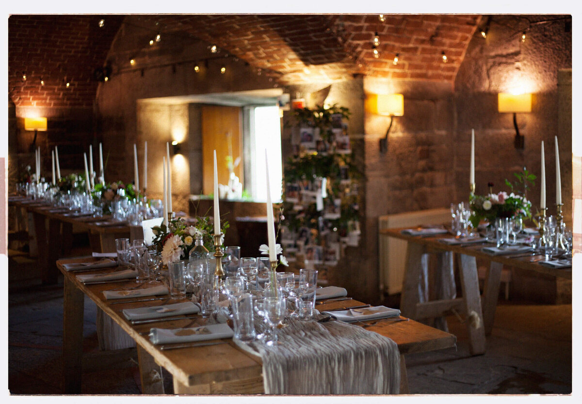 A banquet hall with tables set up for a formal function