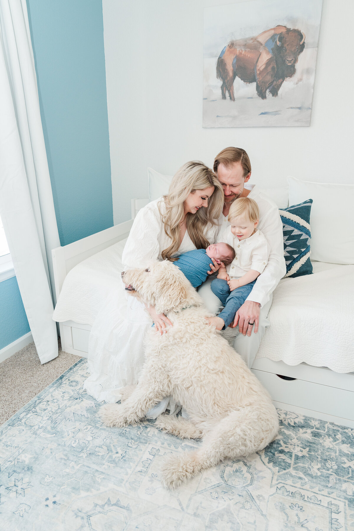 Light and neutral baby boy in home lifestyle newborn photos colorado elena spraguer photography 0025