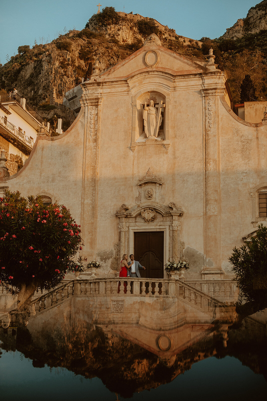 taormina engaged couple wearing red dress