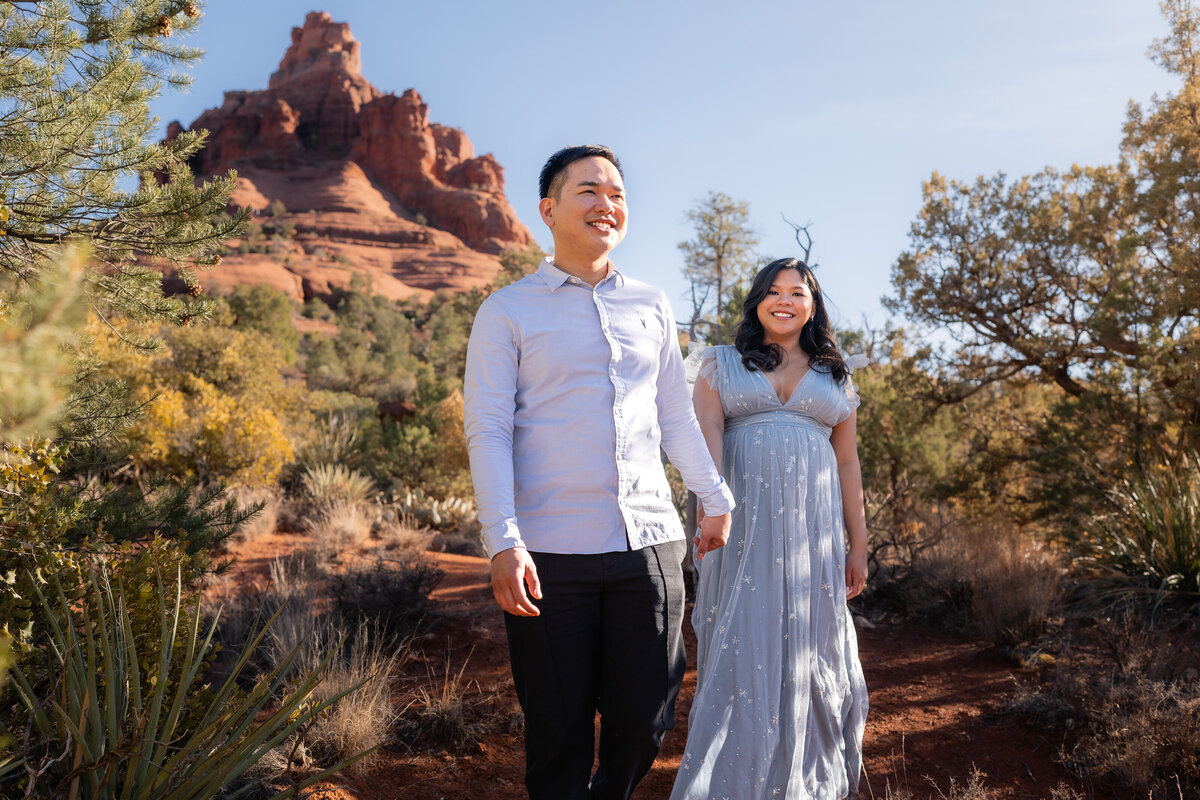 Bell Rock Sedona Arizona Elopement with Asian couple holding hands.
