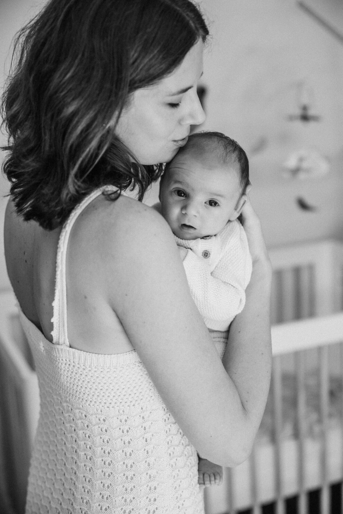mom-holds-newborn-baby