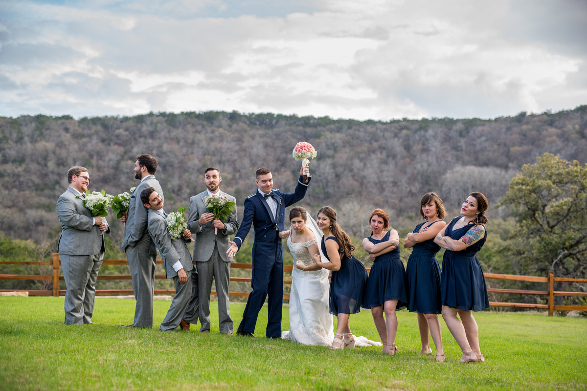 bridal party posing after wedding in the Texas Hill Country
