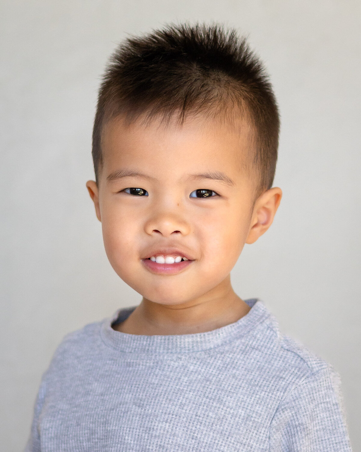 Smiling preschool boy in soft gray tones for Bay Area School Photography with Ellobelle Photography