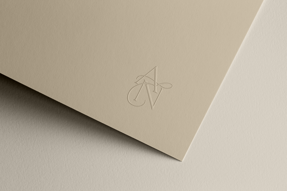 Paper with logo embossed on it.