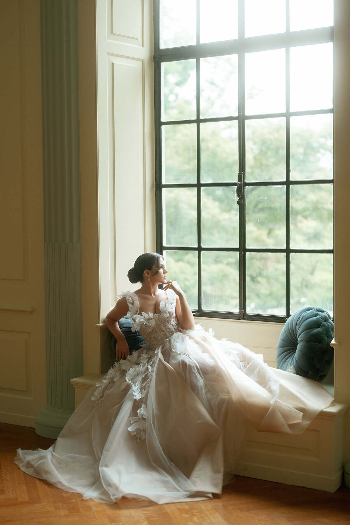 Portrait of a bride in a window