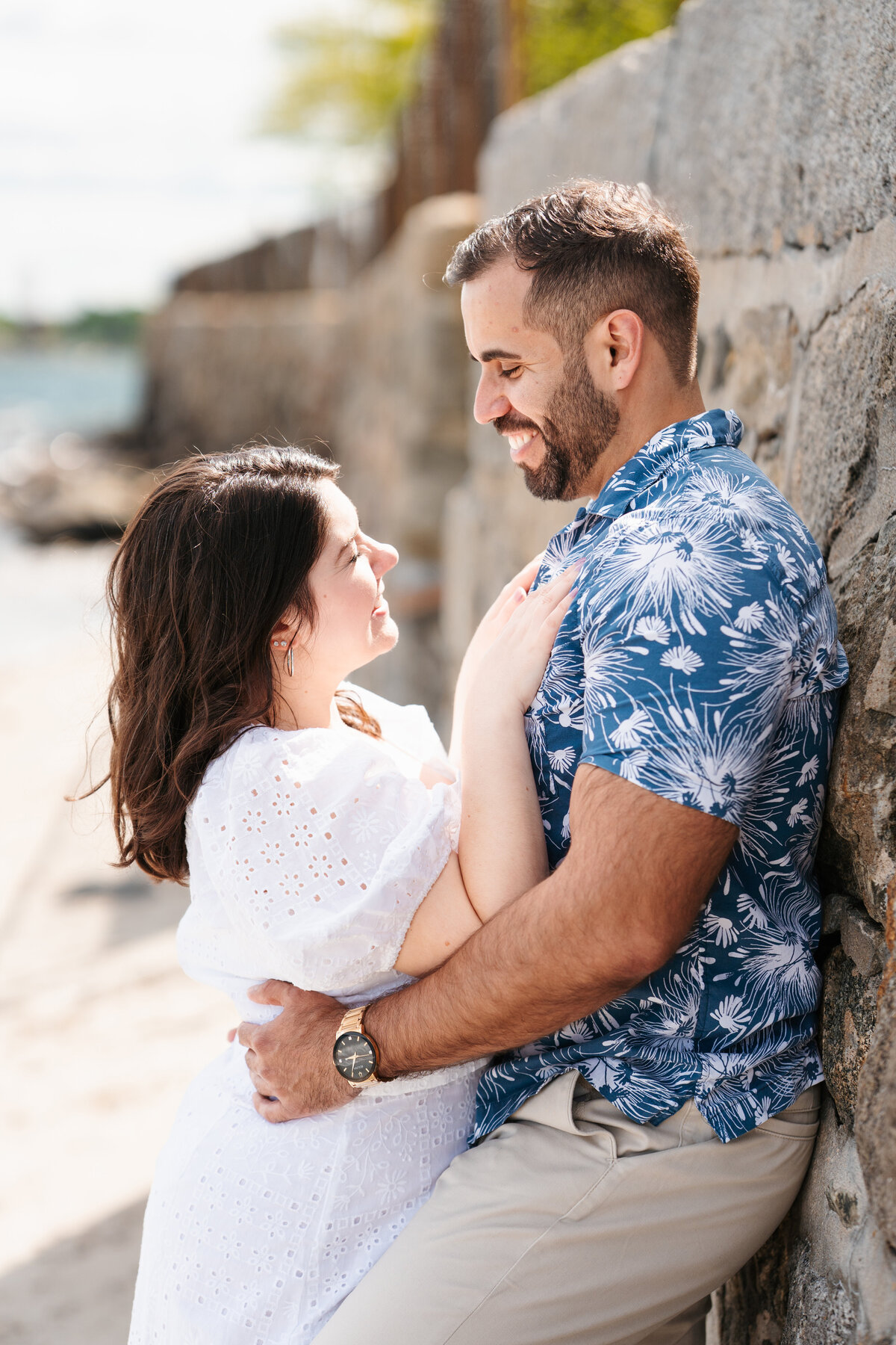 Couple walking through the rose garden at Lynch Park during their Beverly engagement session with Danielle Littles Photography