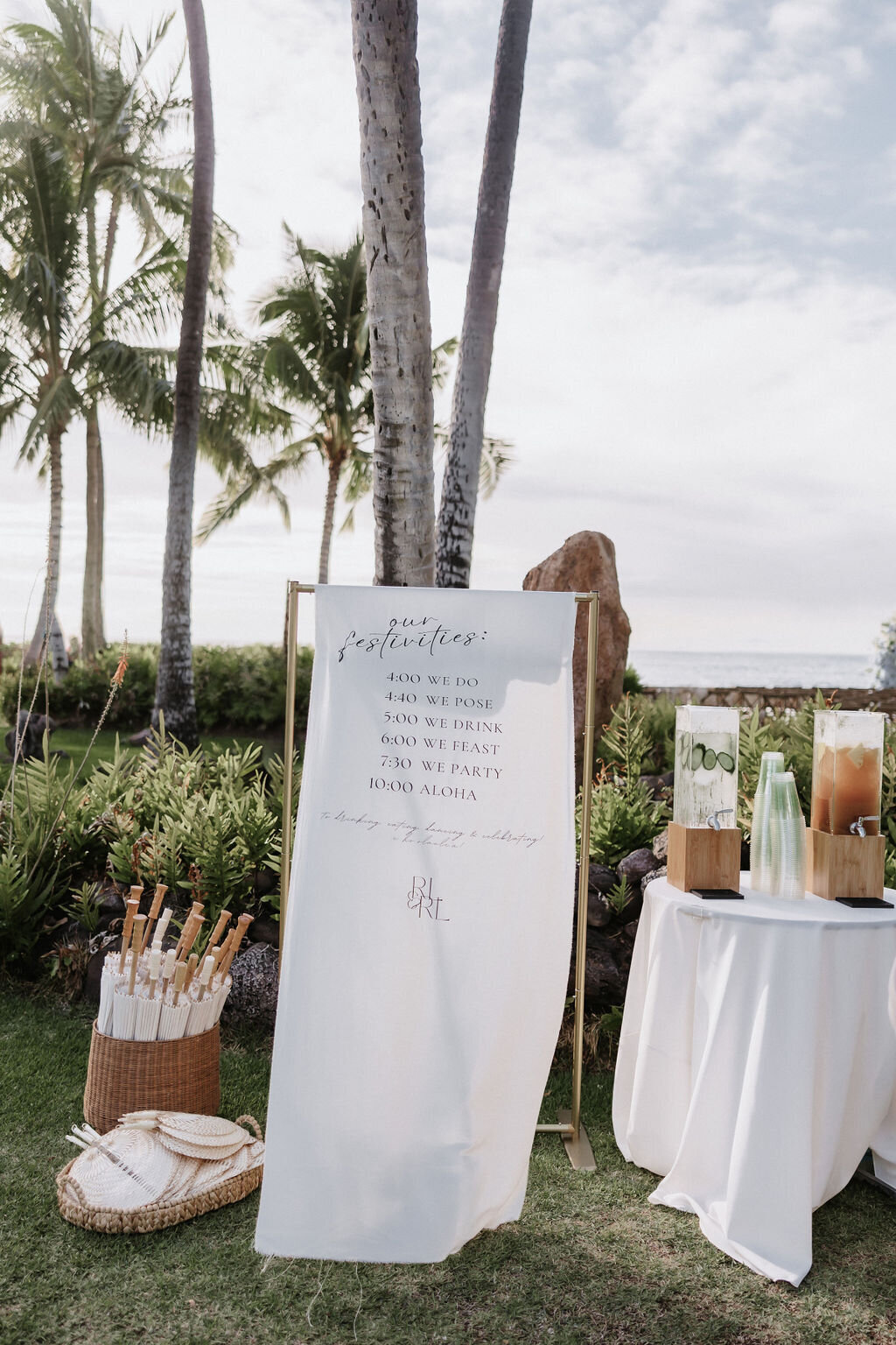Wedding welcome sign at lanikuhonua with  tropical garden aesthetic