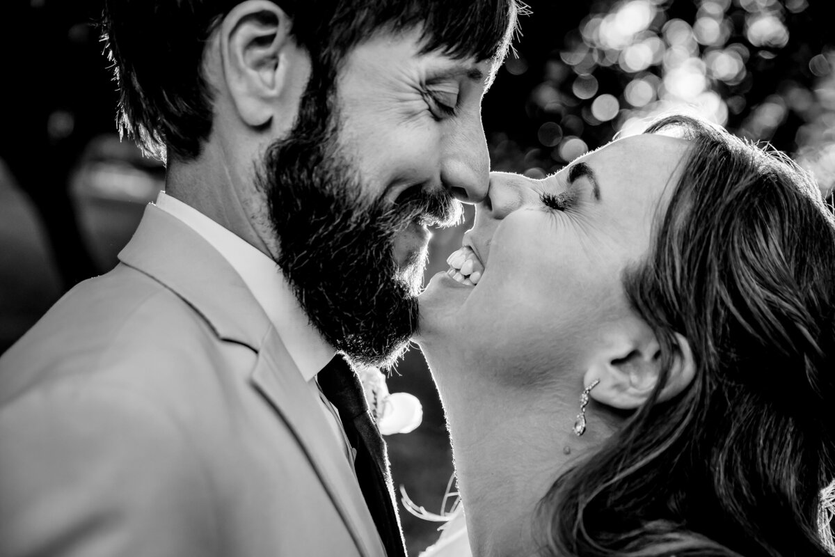 A bride gets up close and personal with her husband following their wedding ceremony in Bend, Oregon.